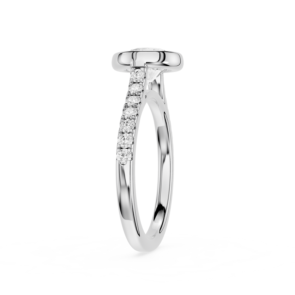 A silver-colored diamond ring with a flat top and a pavé-set diamond band, shown on a plain white background.