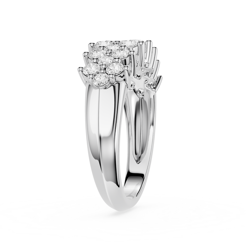 A silver-toned split-shank ring with a prominent cluster of round-cut diamonds at the top, shown on a clean white background.
