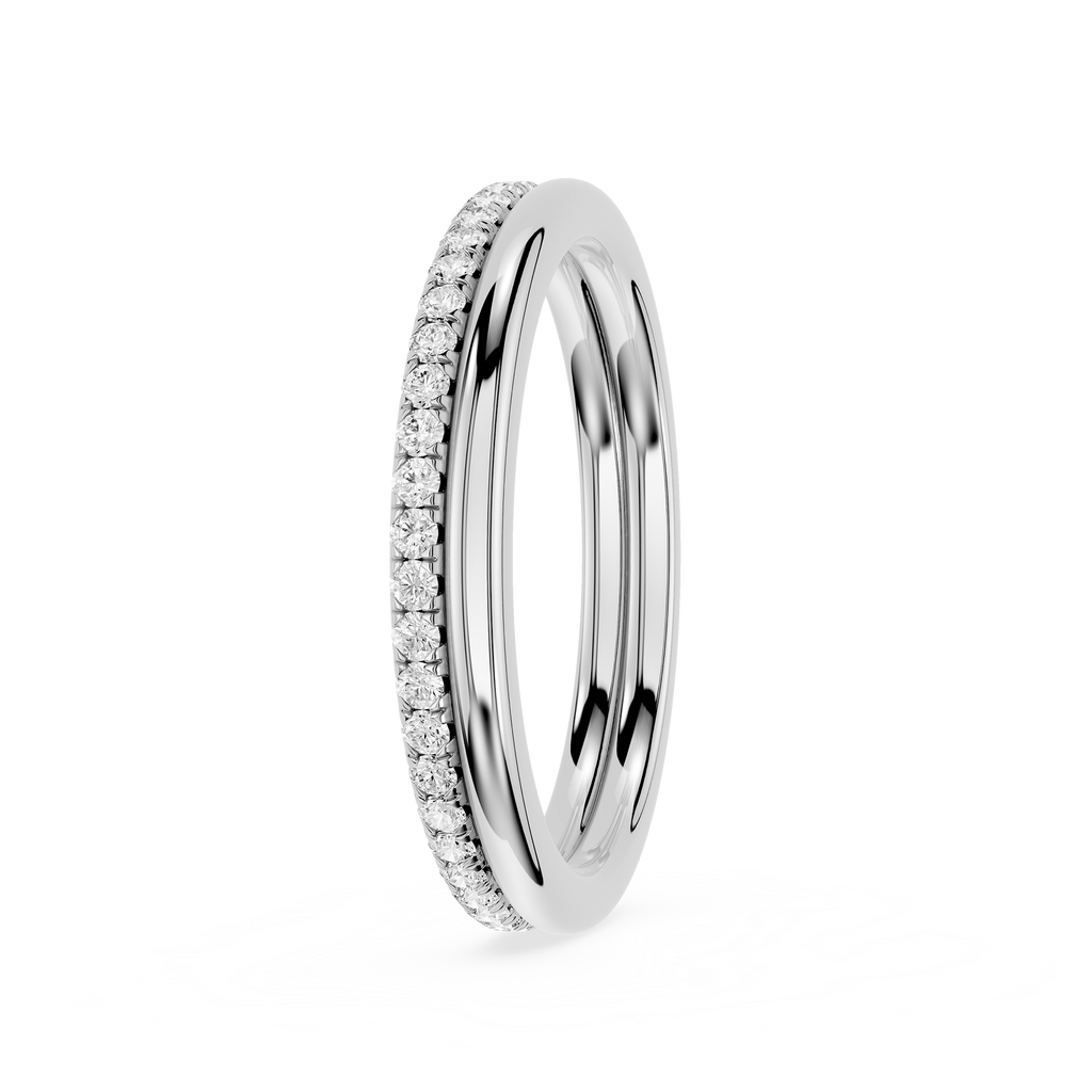 A polished silver-tone eternity ring featuring a half-channel diamond setting on one side and a smooth, polished inner channel on the other, shown on a clean white background.