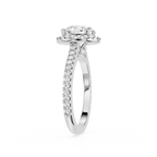 Diamond ring with a white gemstone and smaller diamonds on a white background
