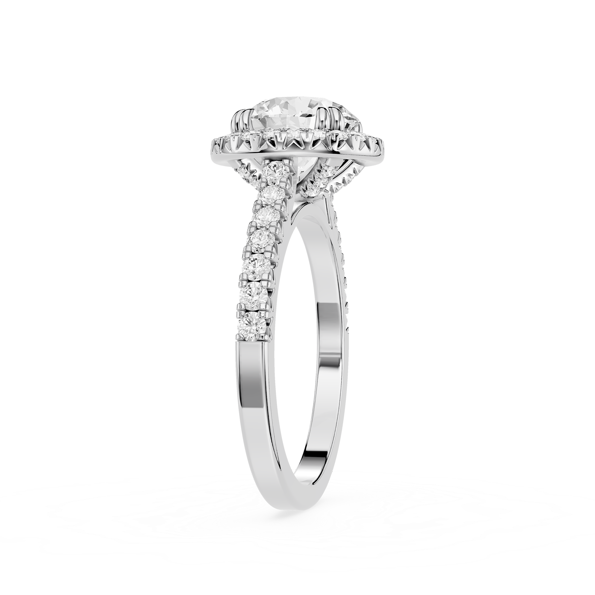 A silver-toned diamond engagement ring with a round-cut center stone, a halo of smaller diamonds, and a shank accented with pavé diamonds, shown on a clean white background.