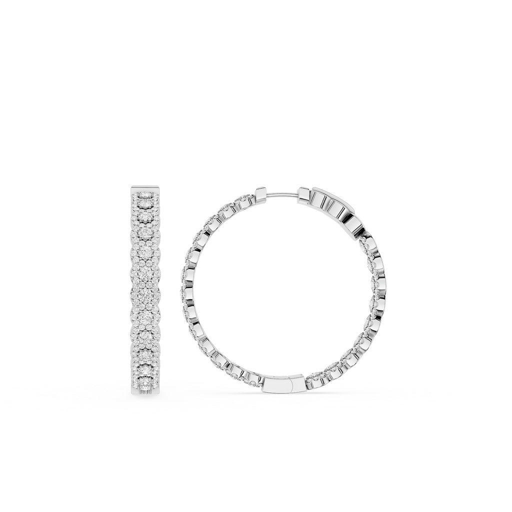 Pair of silver hoop earrings on a white background
