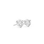 Pair of diamond stud earrings on a white background