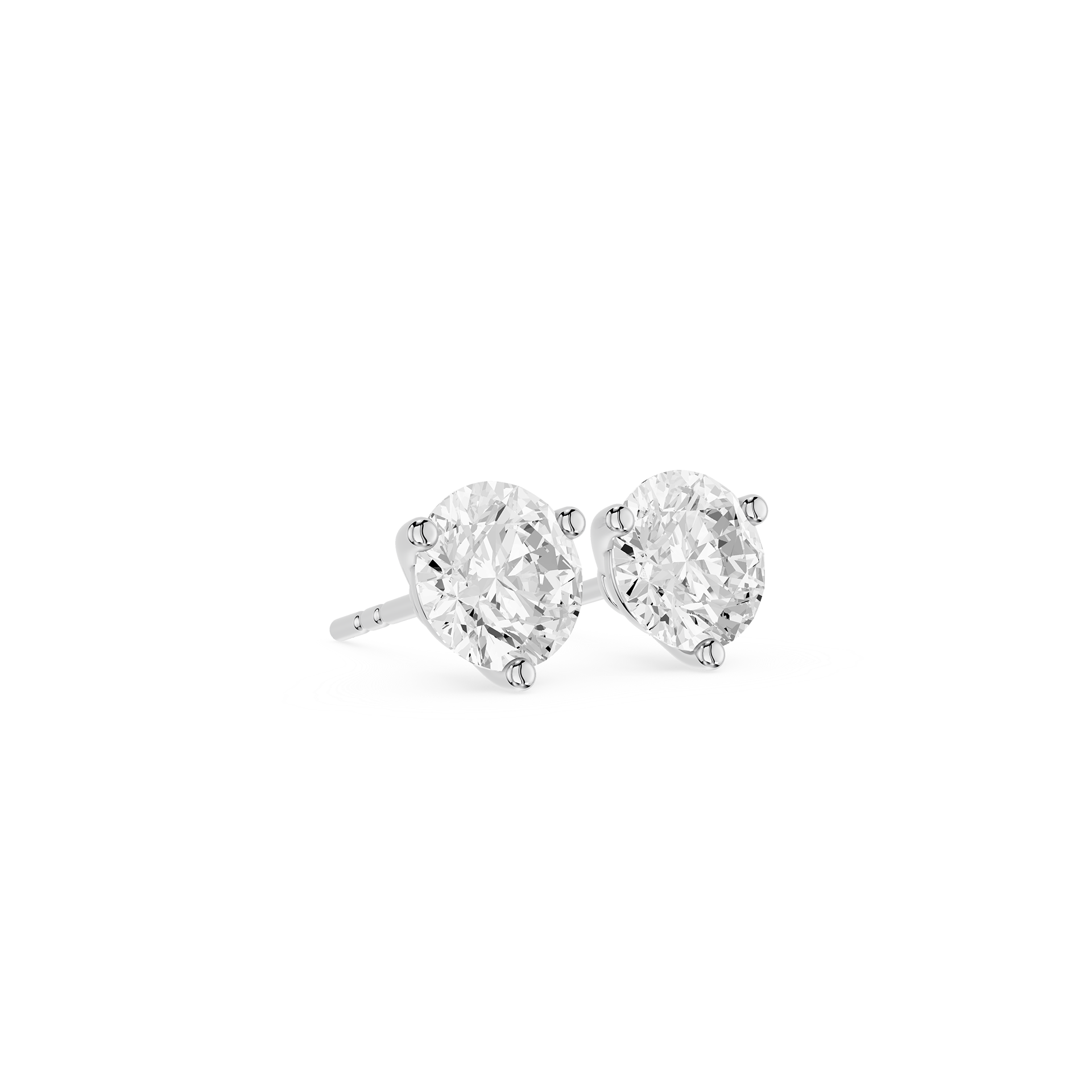 Pair of diamond stud earrings on a white background