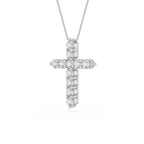 Diamond cross pendant on a white background