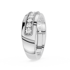 Silver ring with diamond accents on a white background