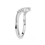 Silver ring with diamond accents on a white background