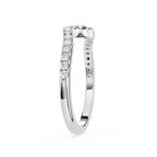 Silver ring with small diamonds on a white background