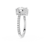 A yellow gold diamond ring with a large round-cut center stone and a pavé band set with small round diamonds, shown on a plain white background.