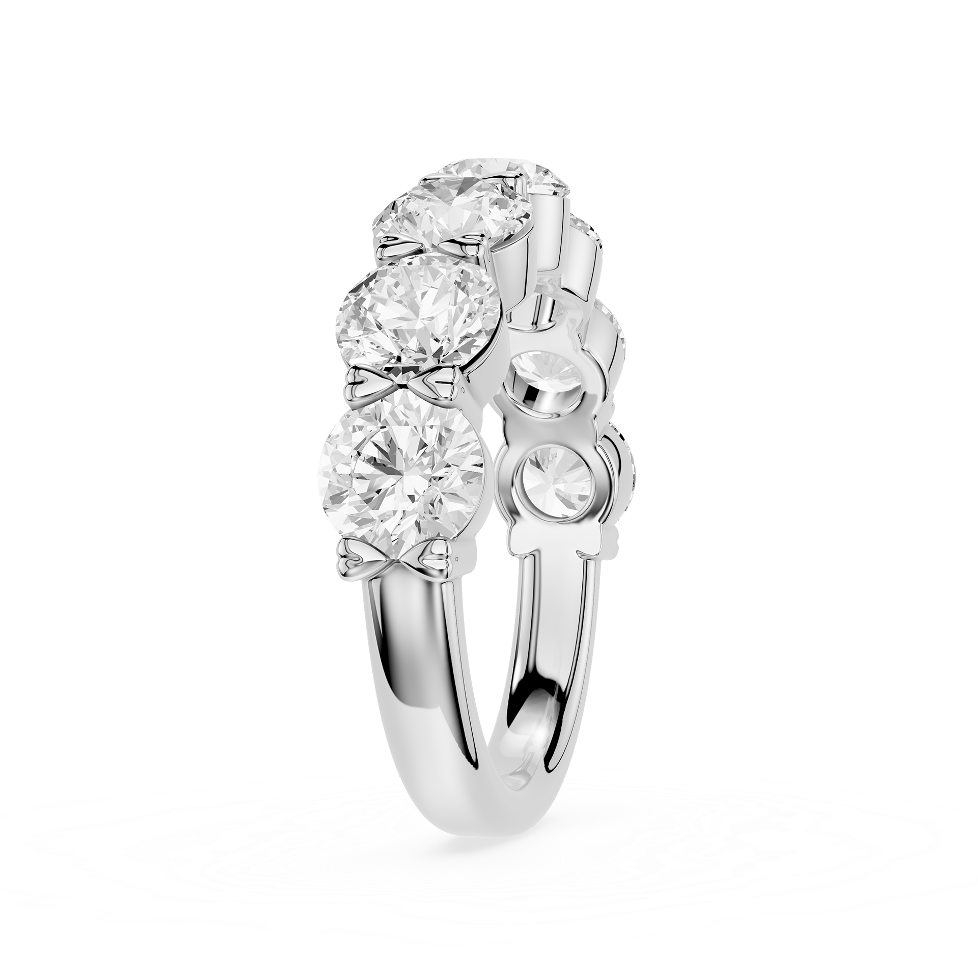 A silver-tone diamond ring featuring three large round-cut diamonds in a row with three smaller diamonds on the side, set against a plain white background.