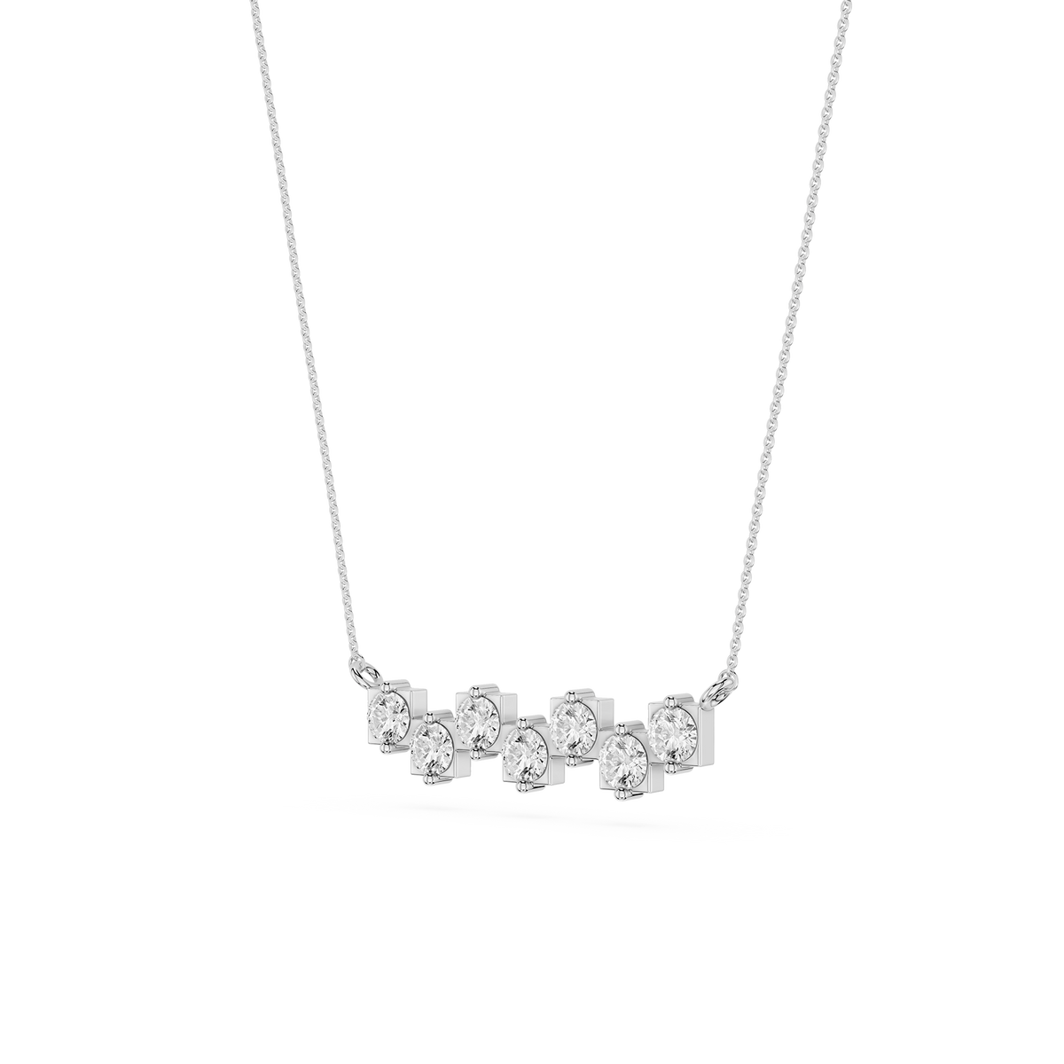 Silver necklace with five round diamonds on a white background