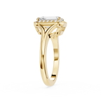 Gold ring with a diamond on a white background