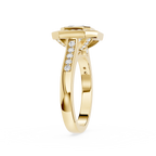 Gold ring with diamond accents on a white background