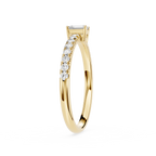 Gold ring with diamonds on a white background
