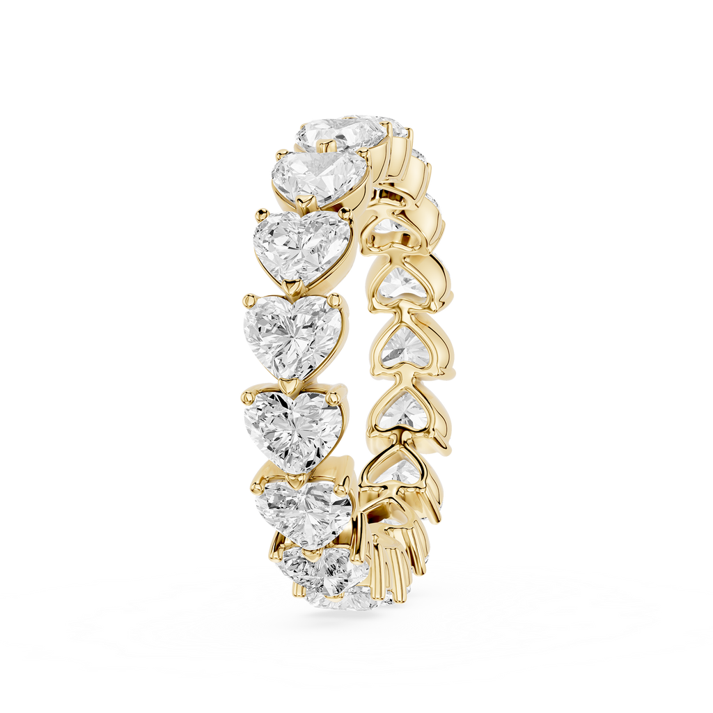 Gold earring with heart-shaped diamonds on a white background