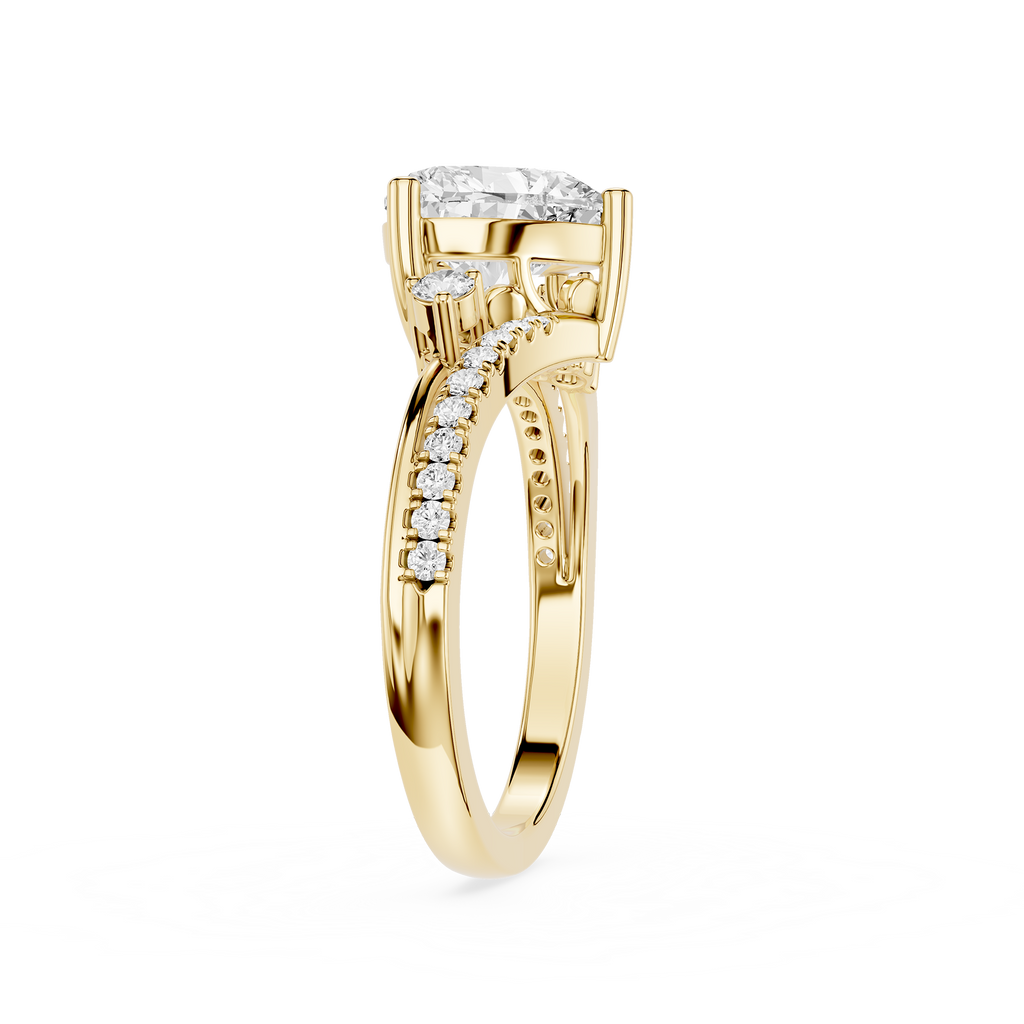 A yellow gold engagement ring featuring a round brilliant-cut center stone and a pavé-set row of small diamonds along the shank, shown on a clean white background.