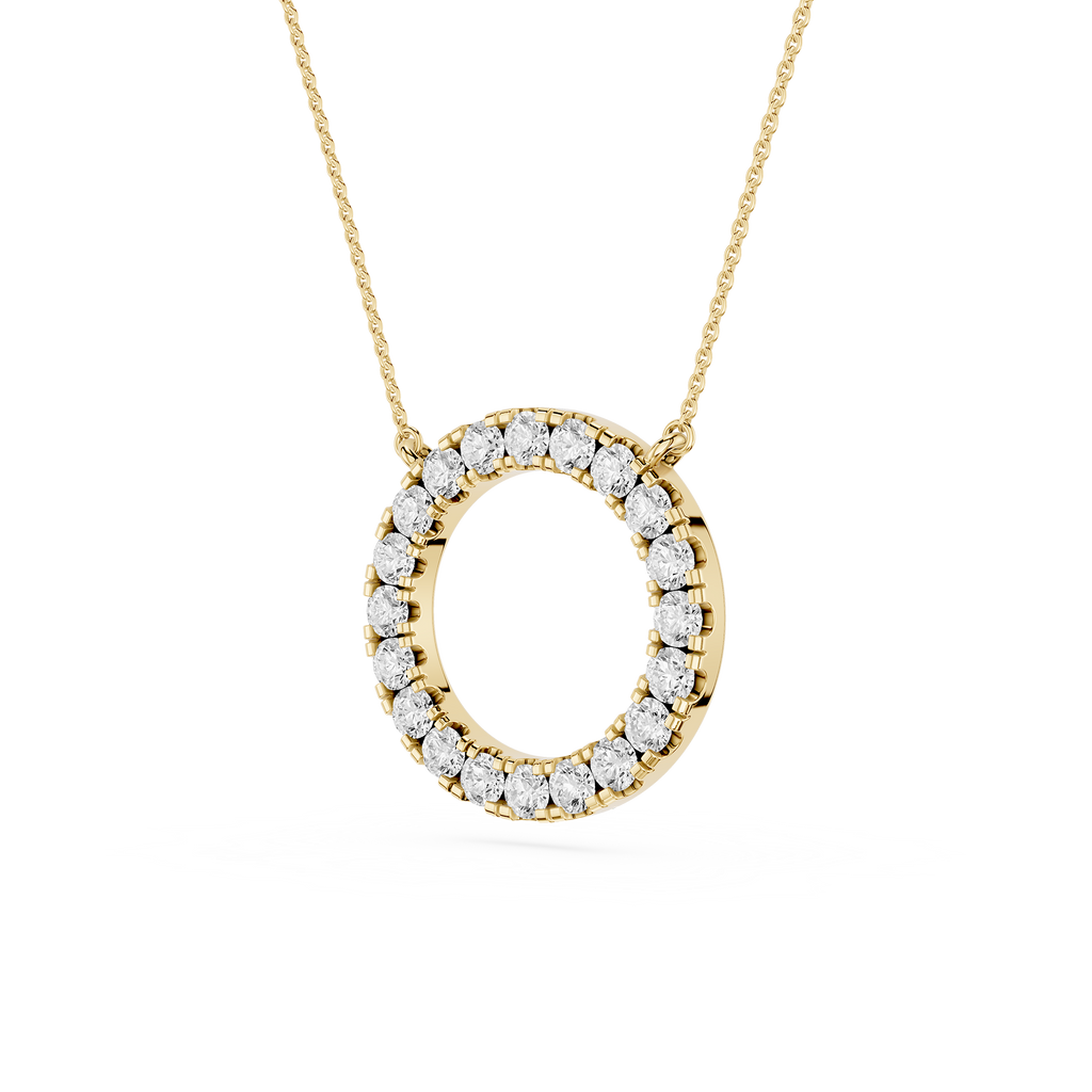 Gold necklace with a round diamond pendant on a white background