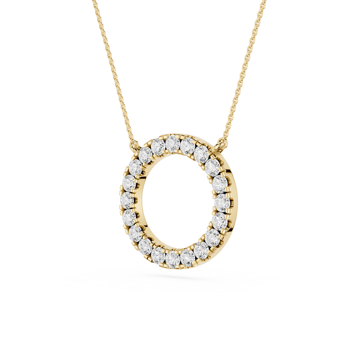 Gold necklace with a round diamond pendant on a white background