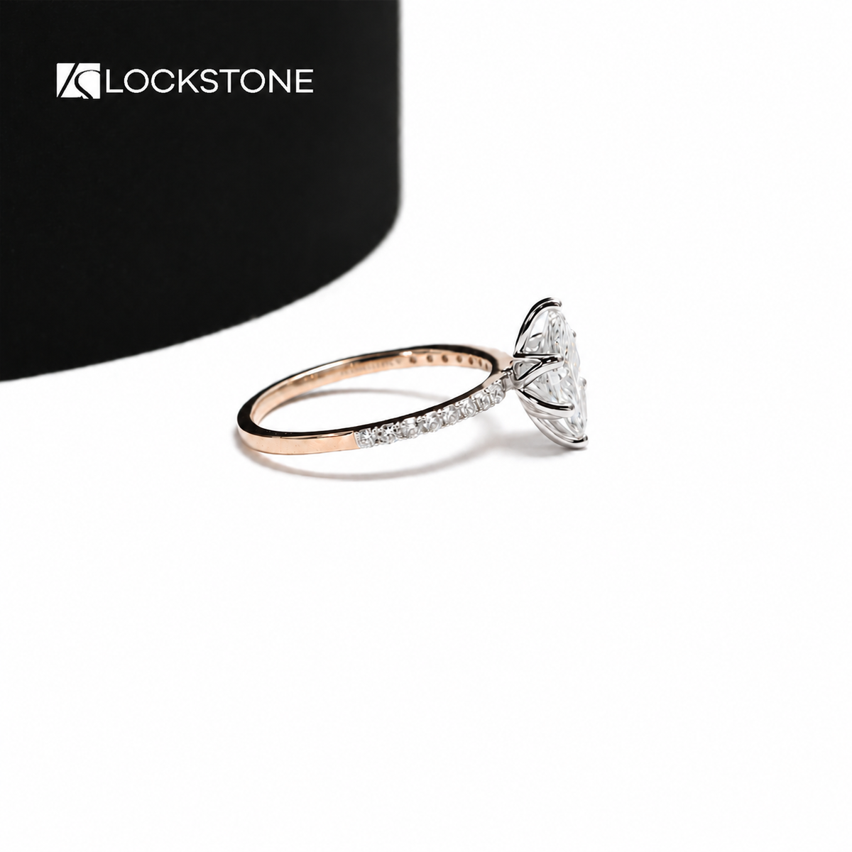Lab grown marquise diamond solitaire ring showcasing pointed diamond ends, secure prongs and delicate pavé side stones