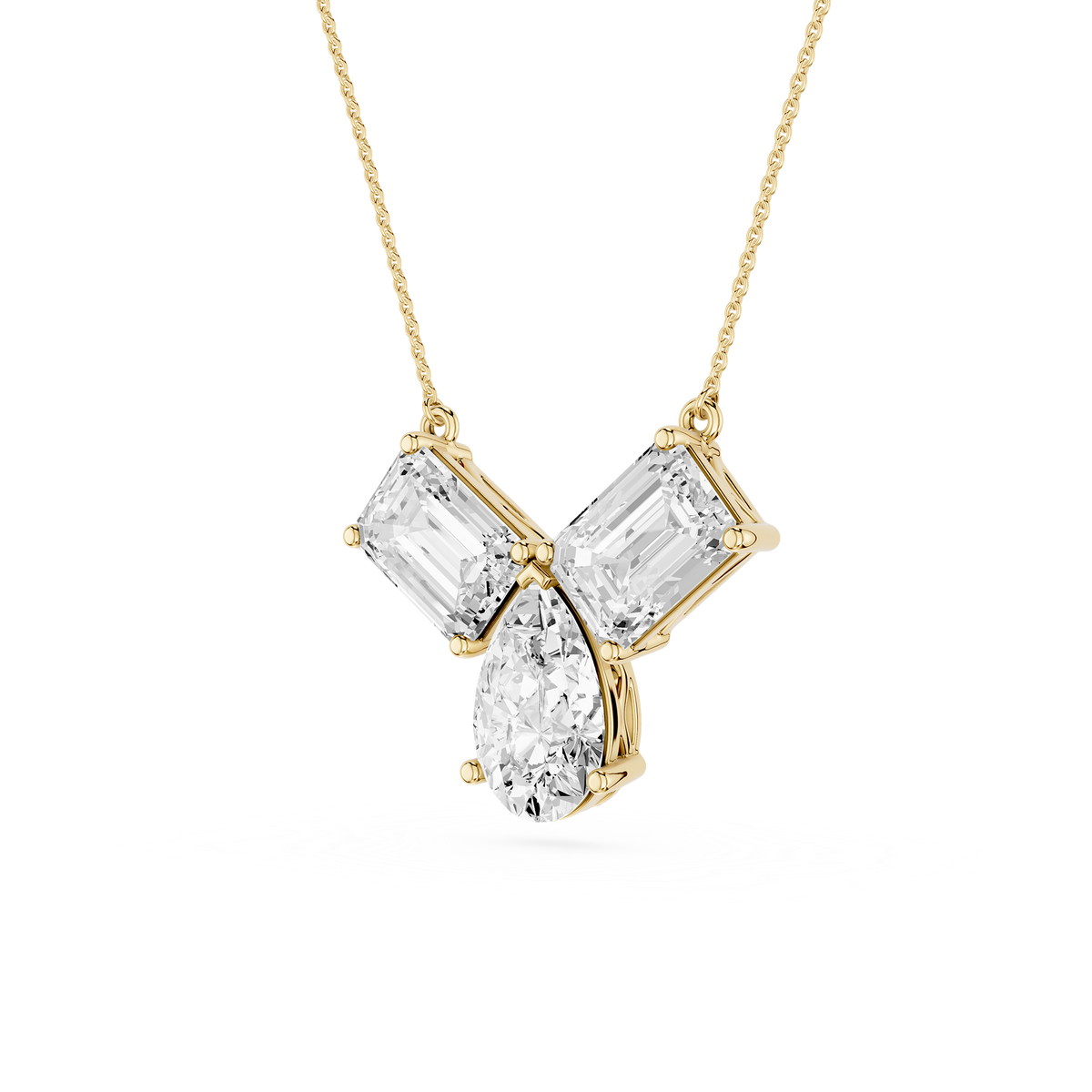 Gold necklace with a diamond pendant on a white background