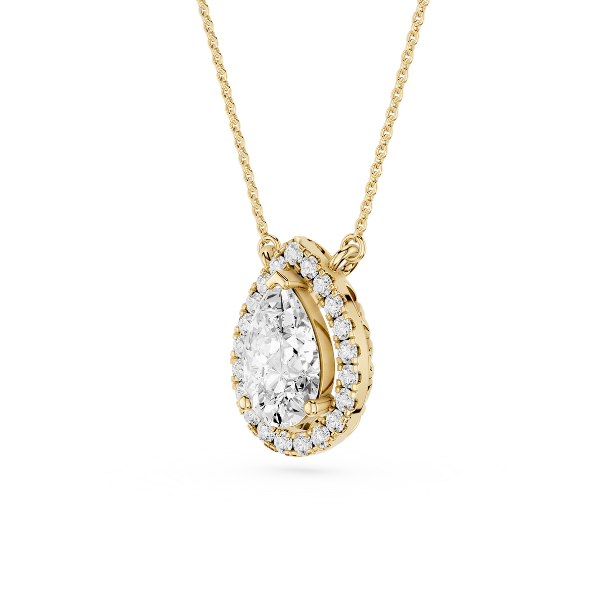 1.2 carat pear shaped lab grown diamond pendant necklace in yellow gold with round diamond halo setting
