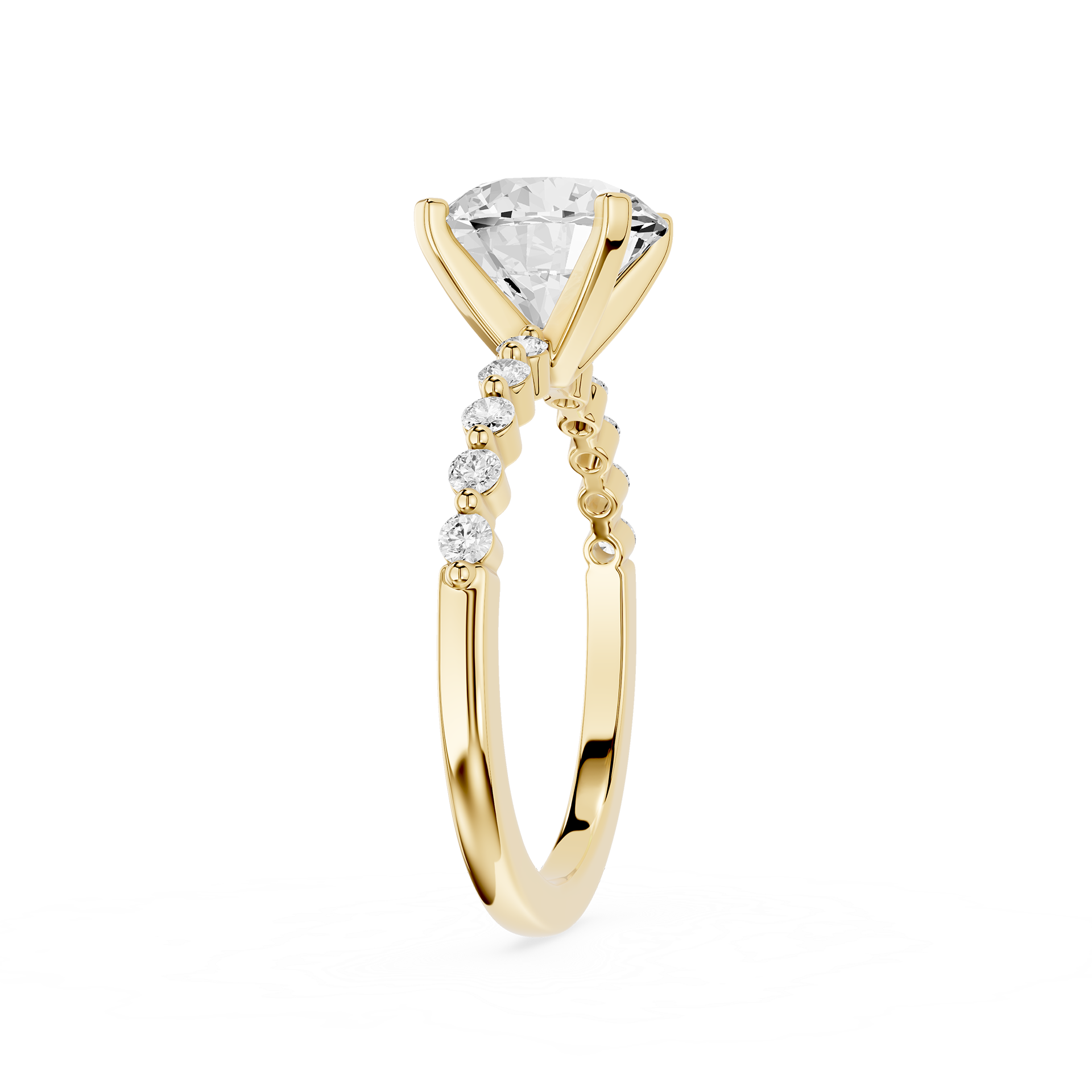 A yellow gold solitaire engagement ring featuring a large round brilliant-cut diamond center stone and a pavé band with small accent diamonds, shown on a plain white background.