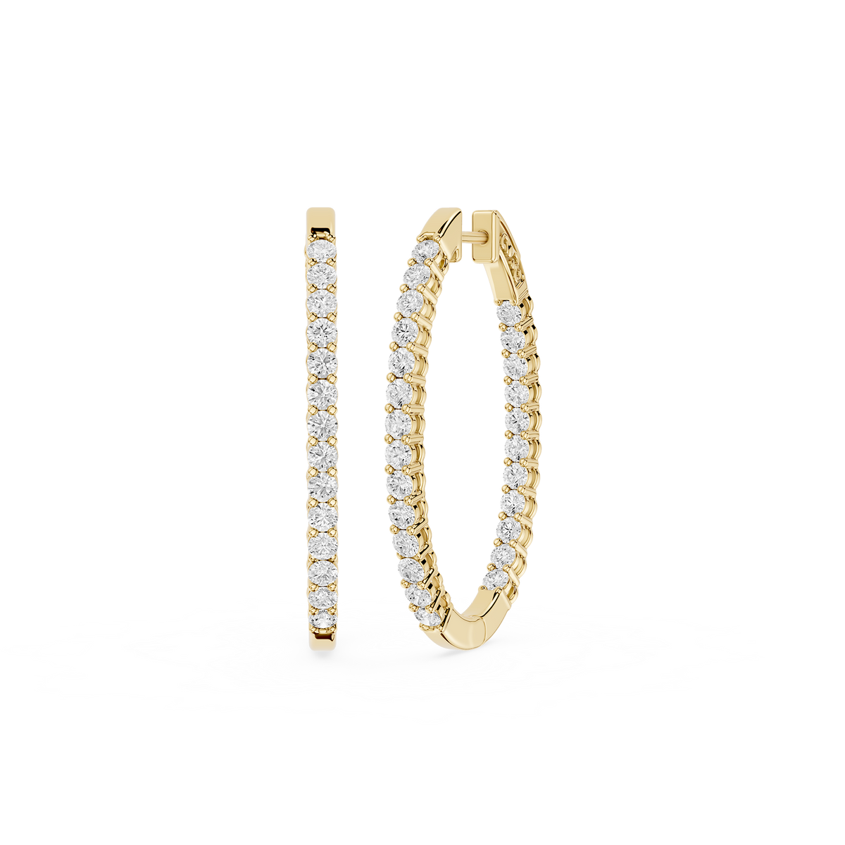 Gold hoop earrings with clear gemstones on a white background