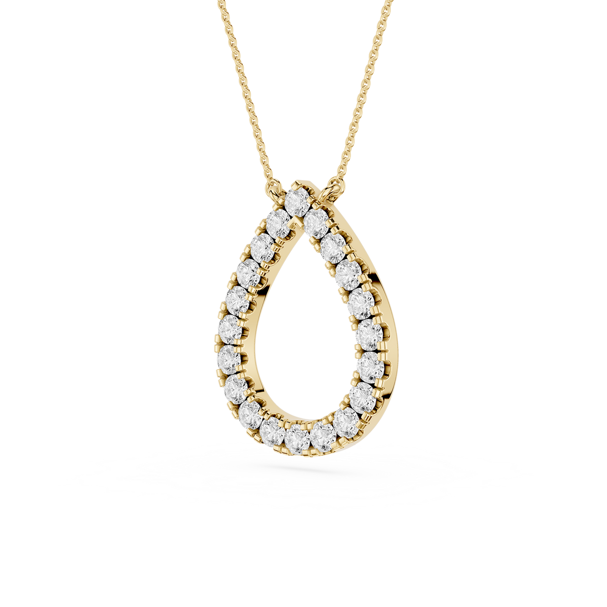 Gold necklace with a teardrop-shaped diamond pendant on a white background