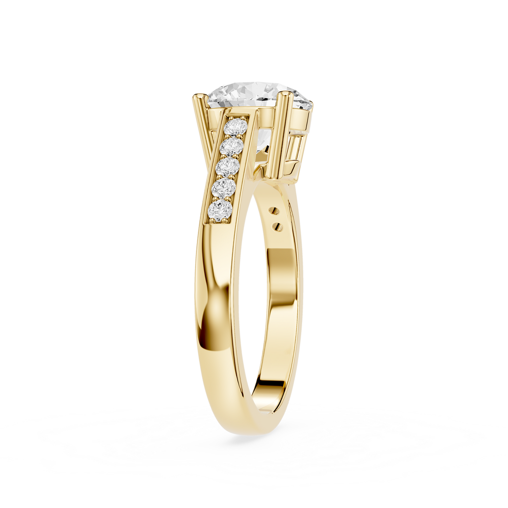 A yellow gold ring featuring a round-cut diamond center stone and a pavé row of smaller round diamonds on the shank, shown against a plain white background.