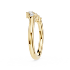 Gold ring with a diamond on a white background