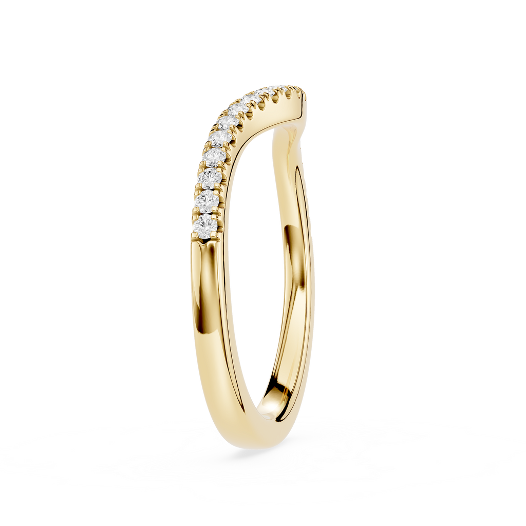 Gold ring with diamond accents on a white background