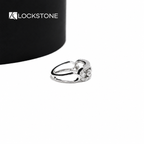 Round cut lab diamond ring with a wide yellow gold band, rectangular cutout details and individually bezel set center stones
