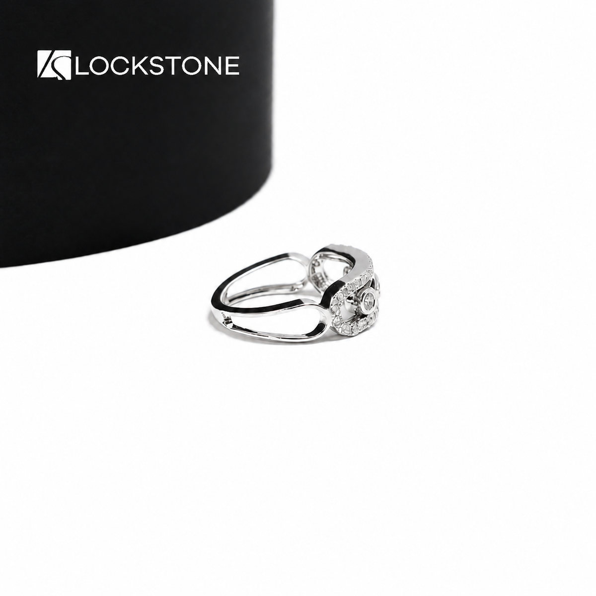 Round cut lab diamond ring with a wide yellow gold band, rectangular cutout details and individually bezel set center stones