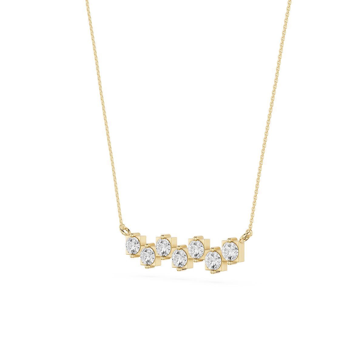 Gold necklace with clear stones on a white background