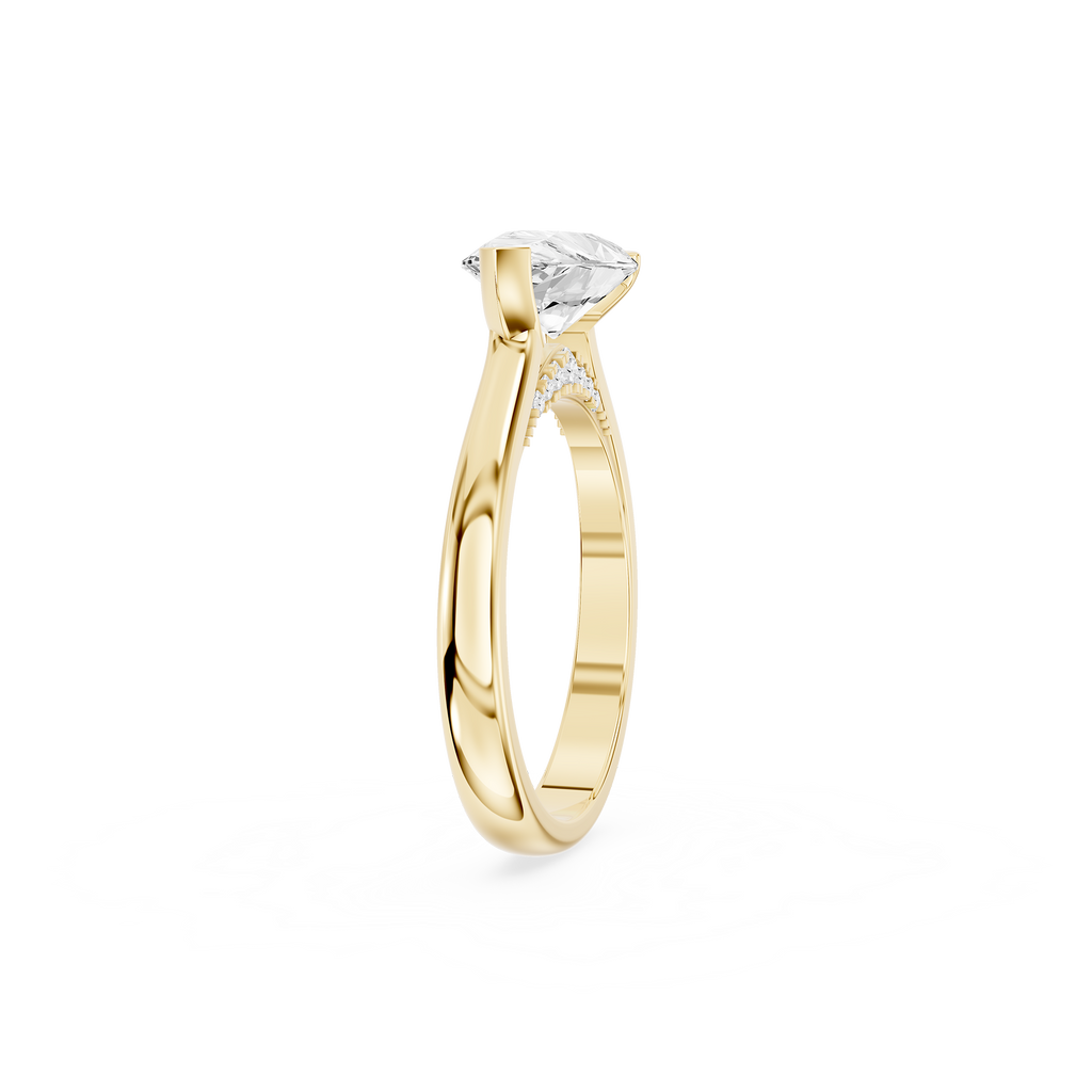 Horizontally set pear shaped lab diamond solitaire ring in yellow gold with an open side setting and crescent bezel