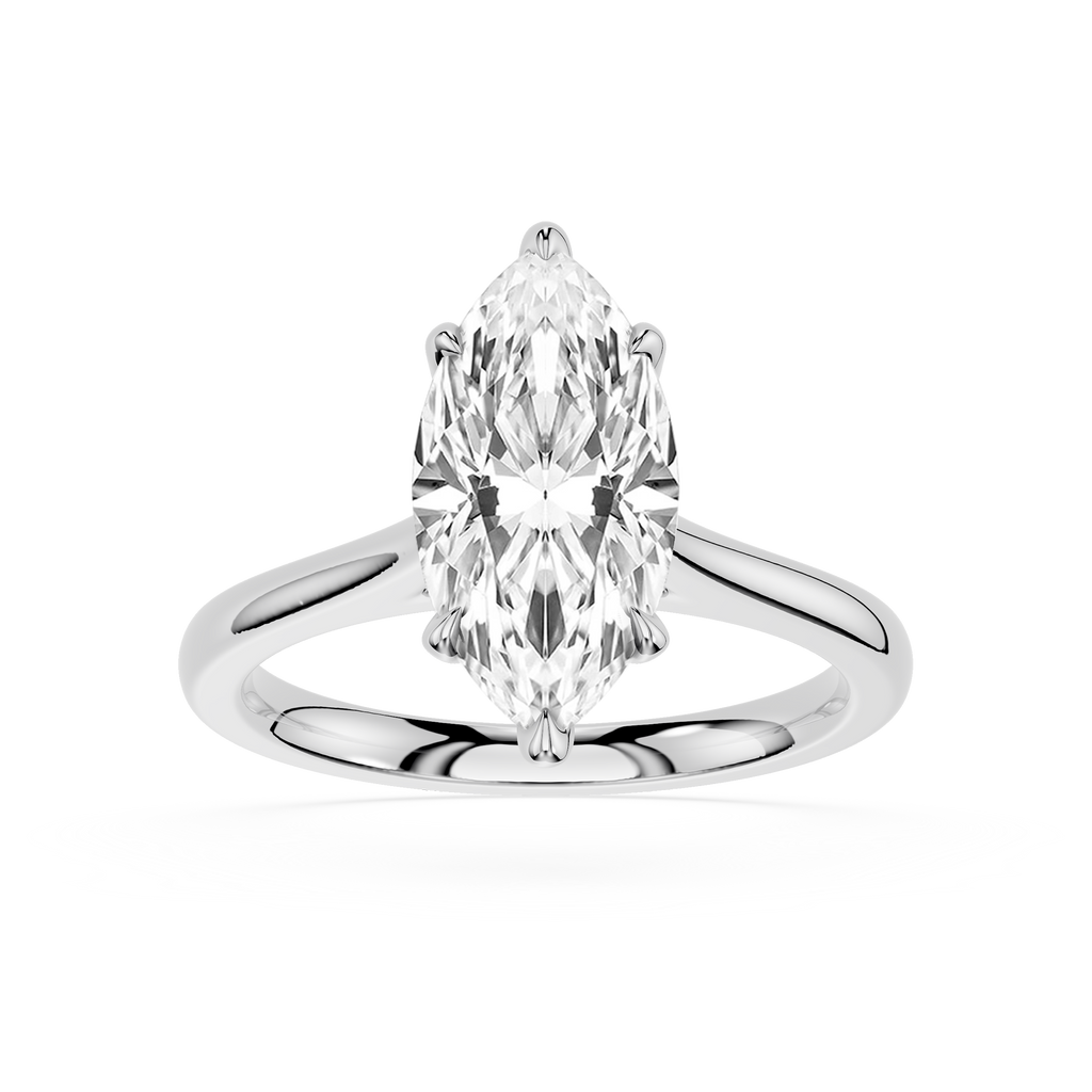 Diamond ring with pear-shaped gemstone on a white background