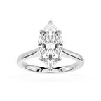 Diamond ring with pear-shaped gemstone on a white background
