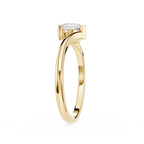 Gold ring with a diamond on a white background