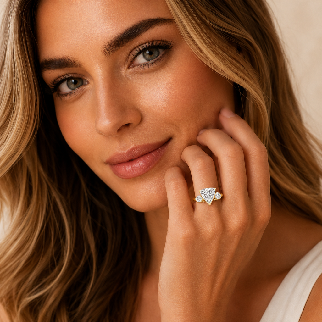 Woman wearing a diamond ring with a soft focus background