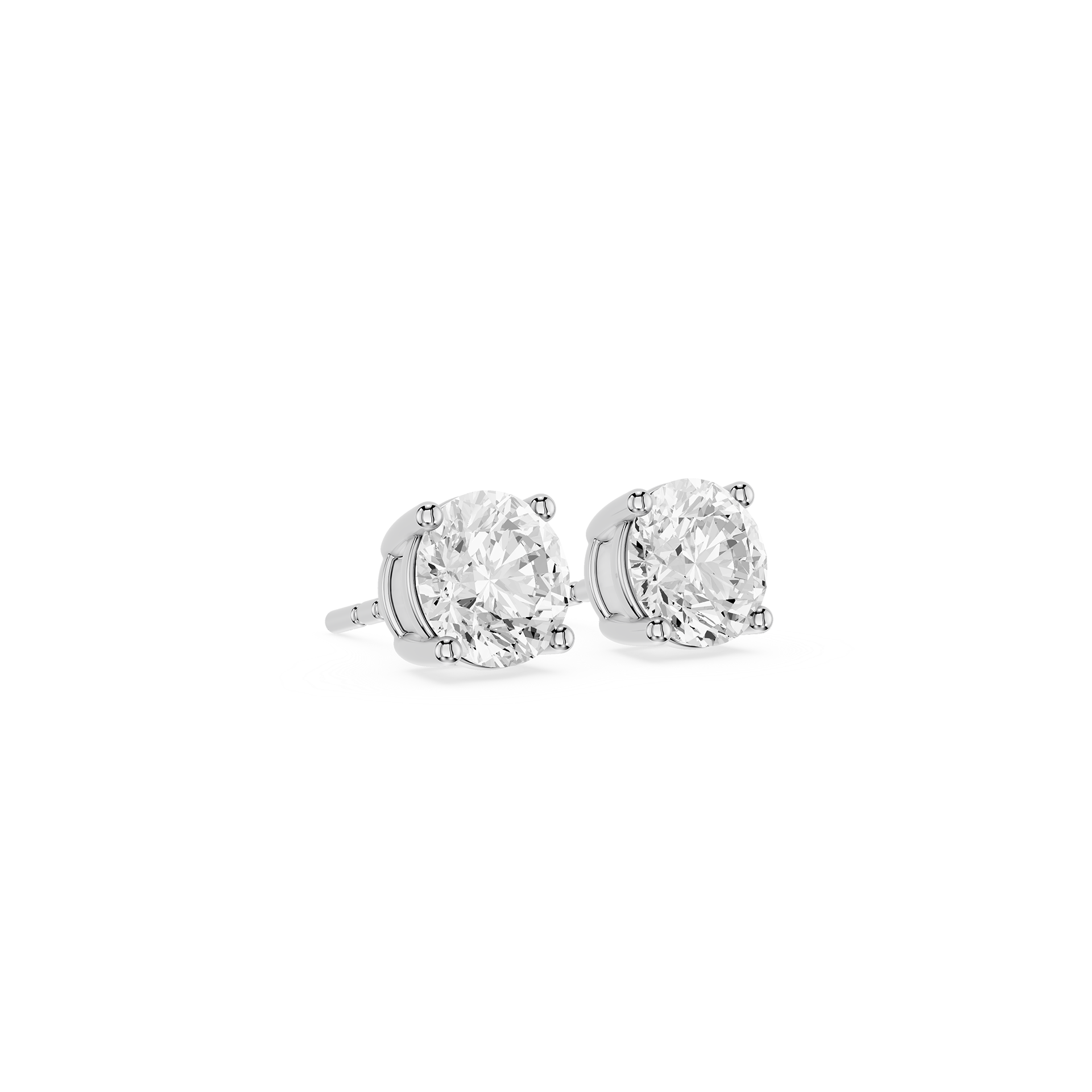 Pair of diamond stud earrings on a white background