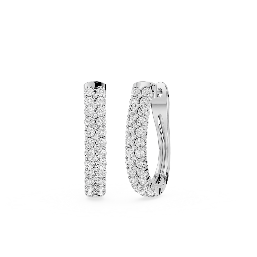 Pair of diamond hoop earrings on a white background