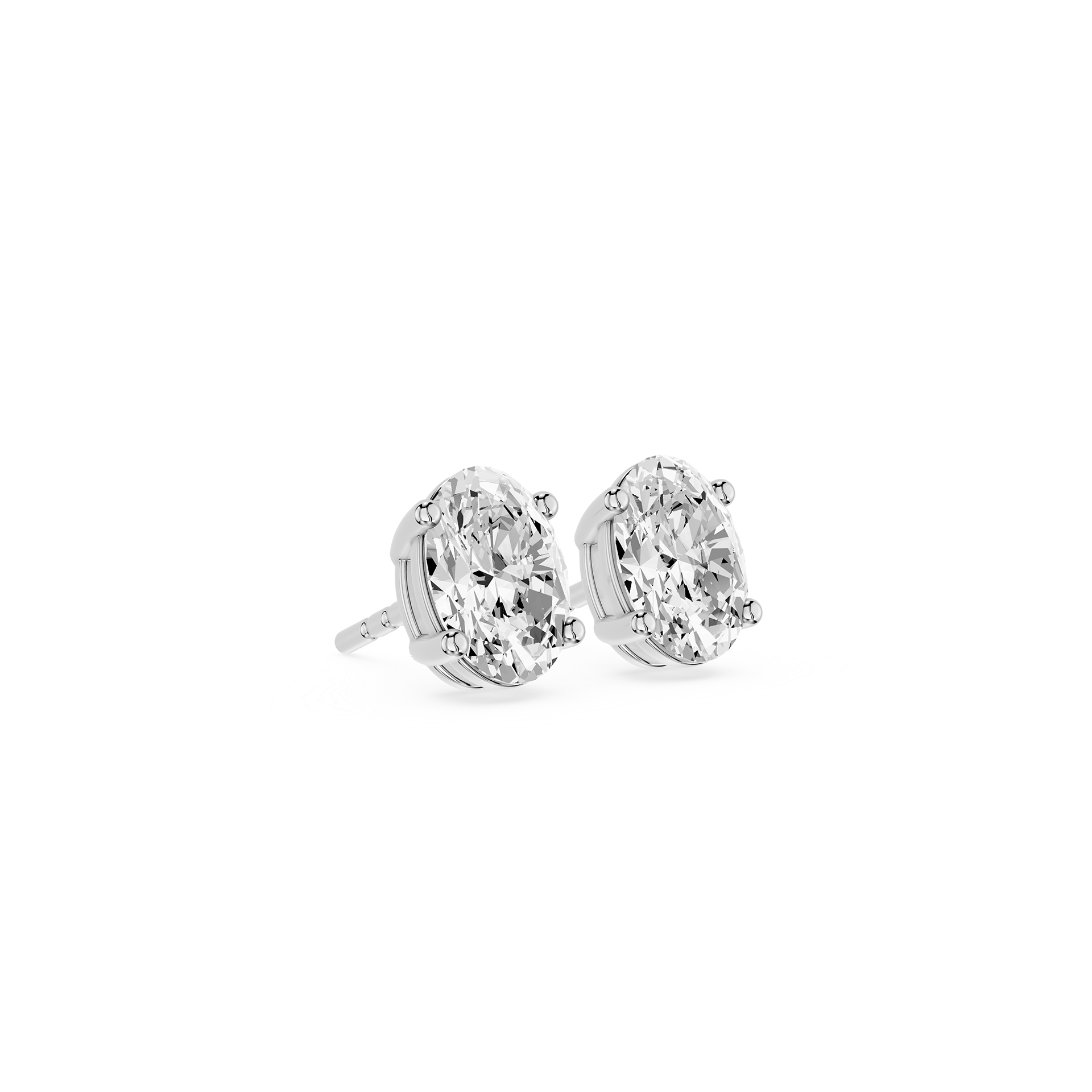 Pair of diamond stud earrings on a white background