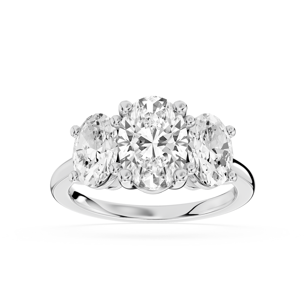 White gold three stone lab grown diamond engagement ring showcasing a large oval center diamond and matching oval side stones