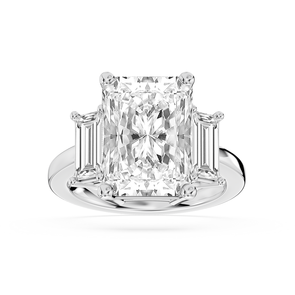 White gold three stone lab grown diamond engagement ring showcasing a radiant cut center and tapered baguette side diamonds