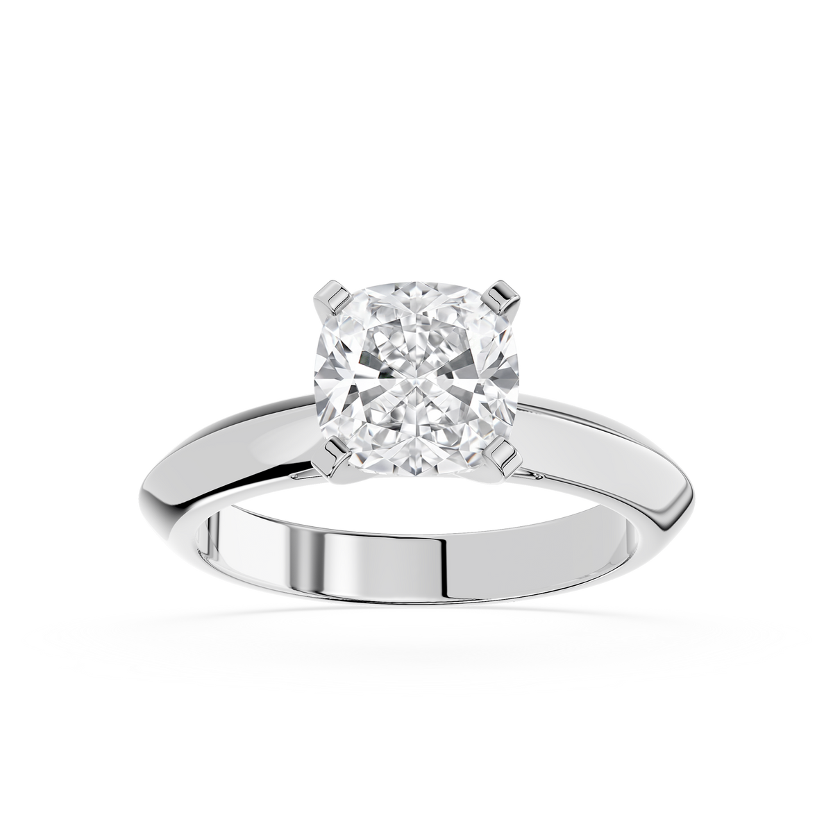 Cushion lab-grown diamond four-prong ring in platinum for a luxurious appearance.