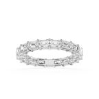 A silver-toned eternity ring featuring a continuous row of baguette-cut clear gemstones, shown on a clean white background.