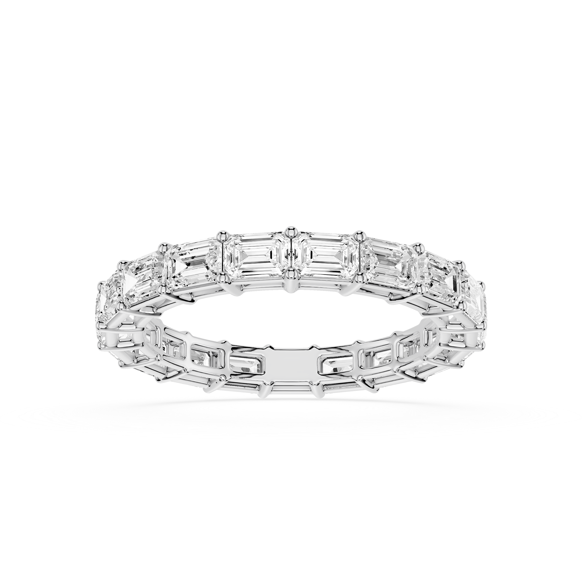 A silver-toned eternity ring featuring a continuous row of baguette-cut clear gemstones, shown on a clean white background.