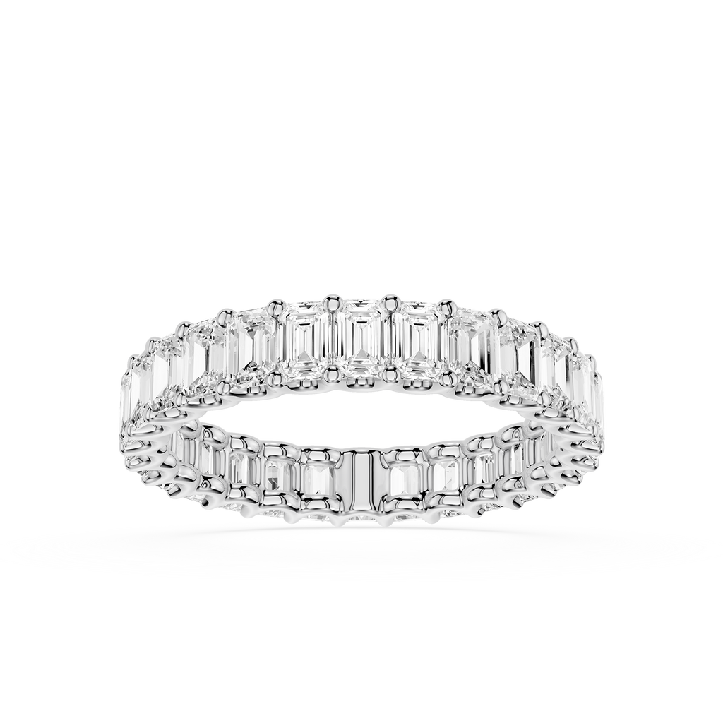 A double-row eternity ring featuring baguette-cut clear gemstones in a silver-toned setting, presented on a clean white background.