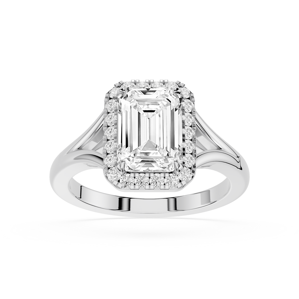 Diamond ring with emerald-cut center stone on a white background
