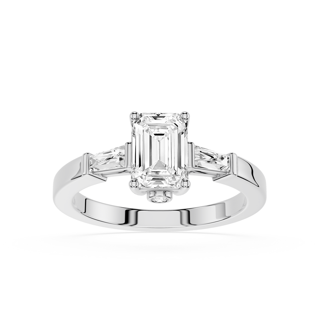 Diamond ring with emerald-cut center stone and smaller side stones on a white background